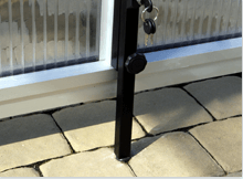 A lockable face pin on the end of a pool enclosure