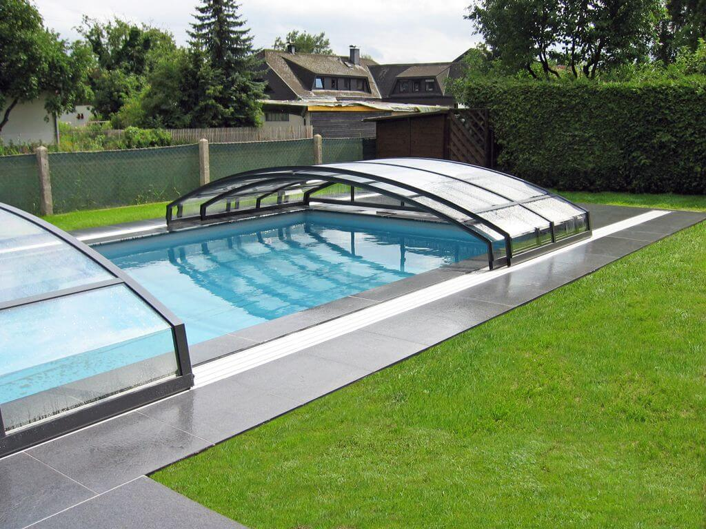 A pool track that has been recessed into the paving around a swimming pool
