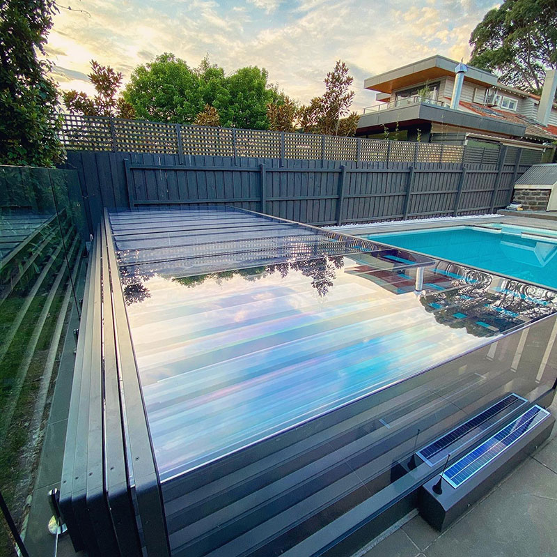 A motorized pool enclosure that can be operated by remote control