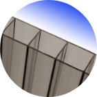 Tinted twin wall polycarbonate for a pool enclosure